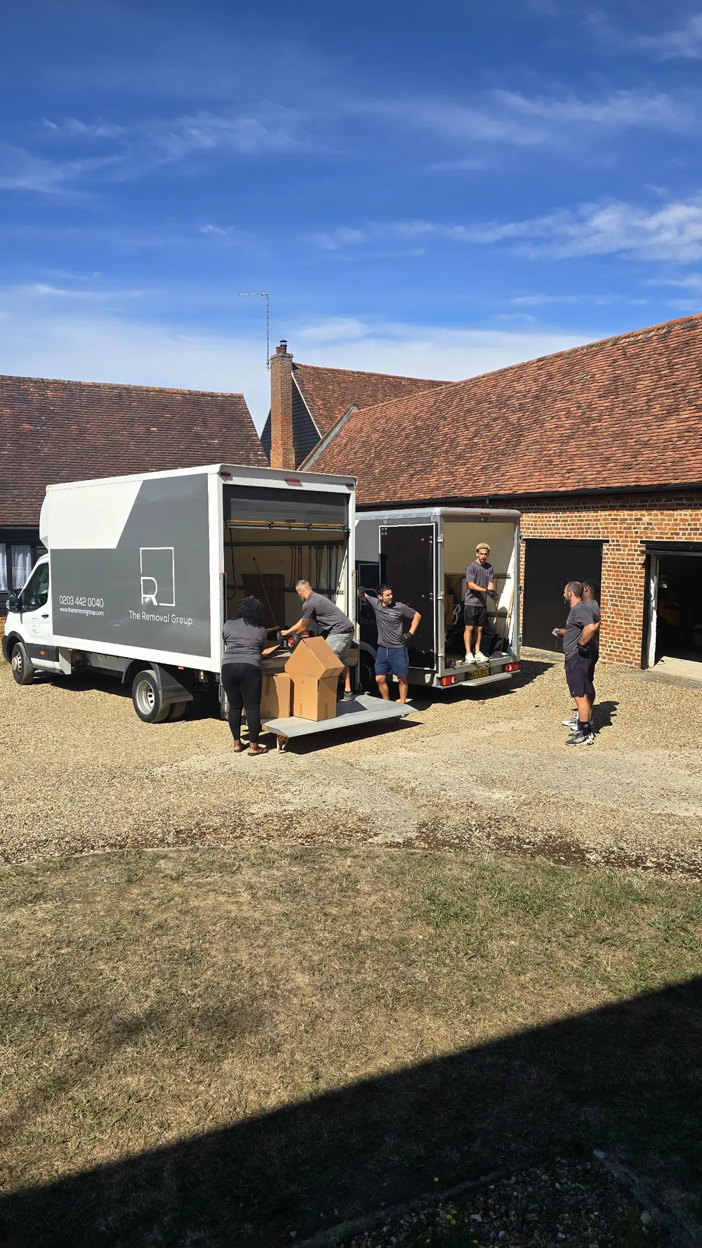 The Removal Group crew unloading vans on a house move